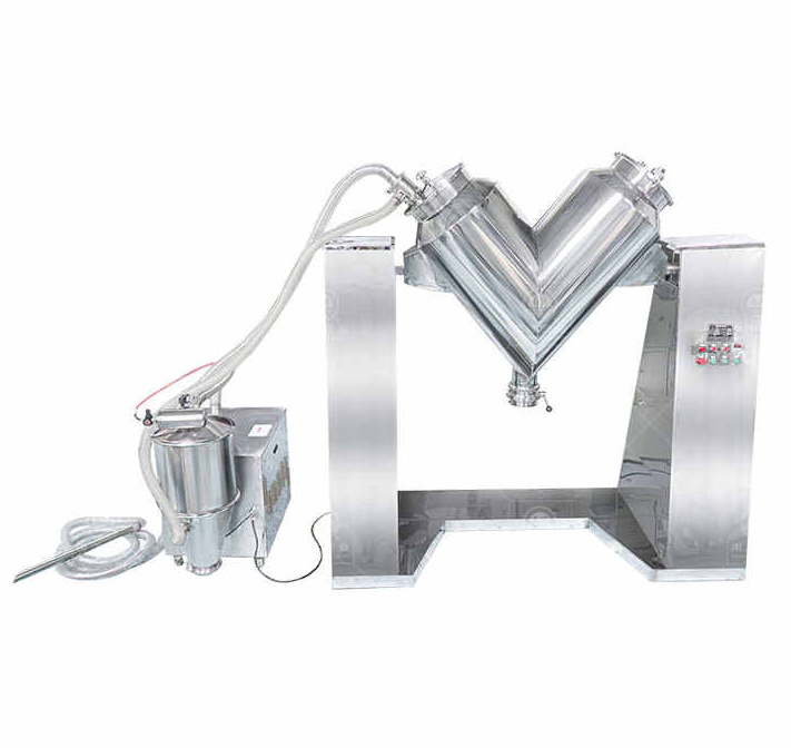 Vacuum feeder for mixer