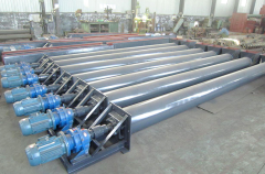 What is the purpose of a screw feeder?